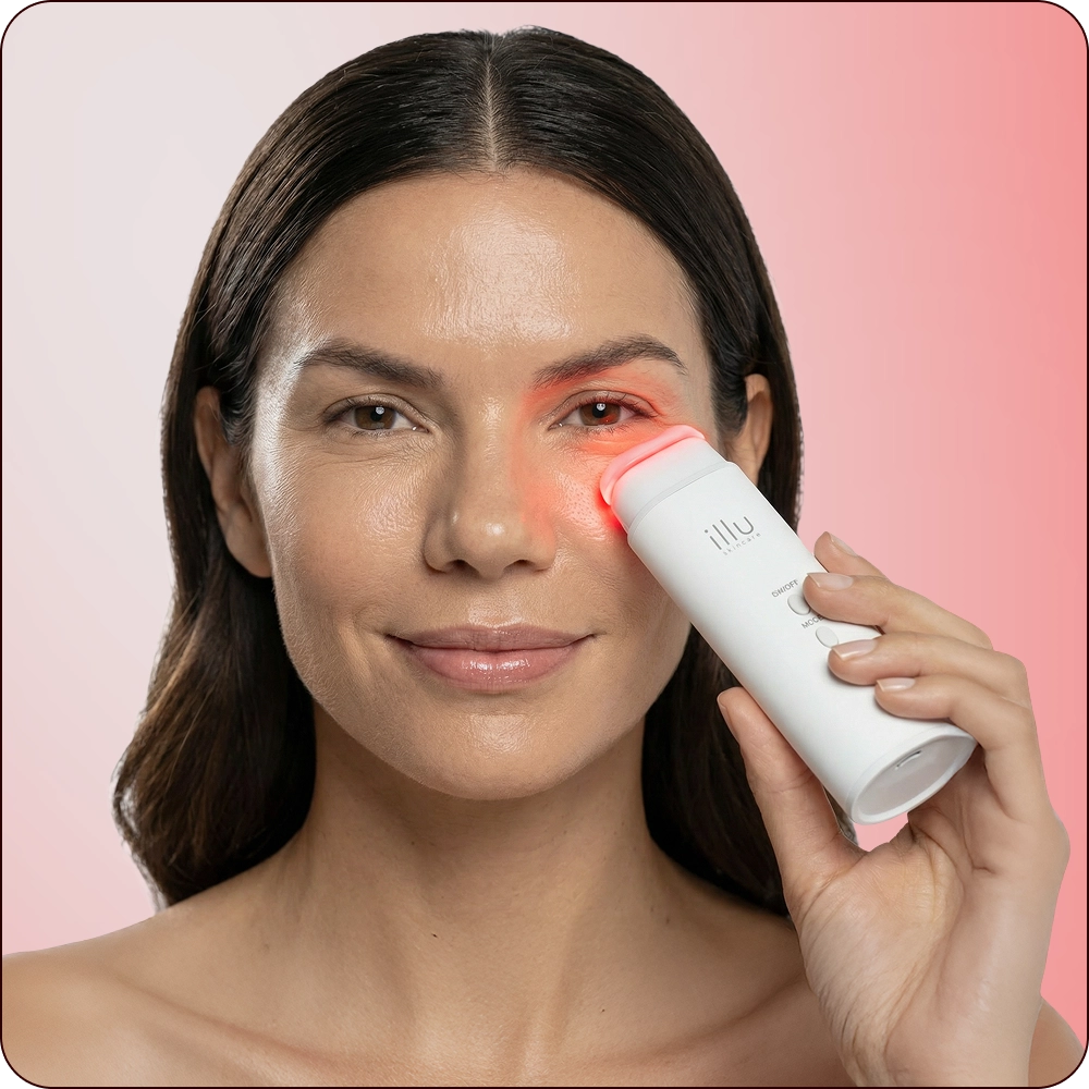 Woman using ILLU Face Toner on her cheek with light therapy, demonstrating a simple three-step skincare routine for hydration, repair, and glow.